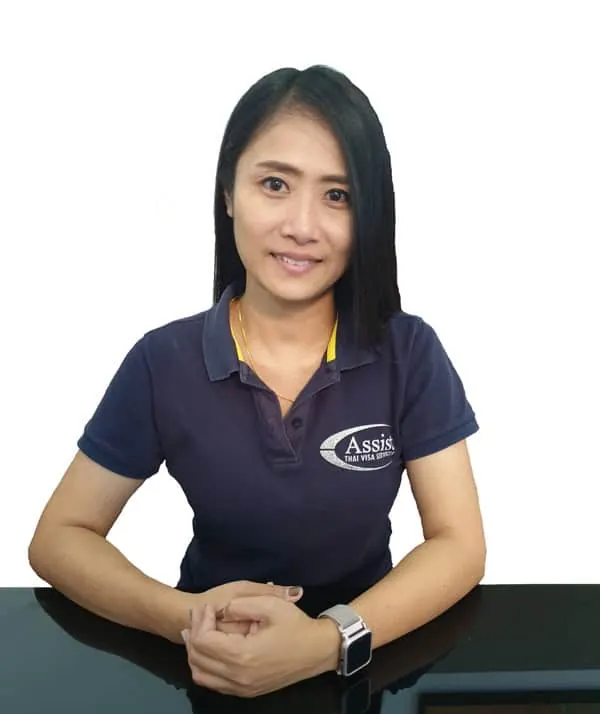 A member of the Assist team in a navy Assist polo shirt
